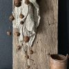 decoratieve tak met roestkleurige belletjes